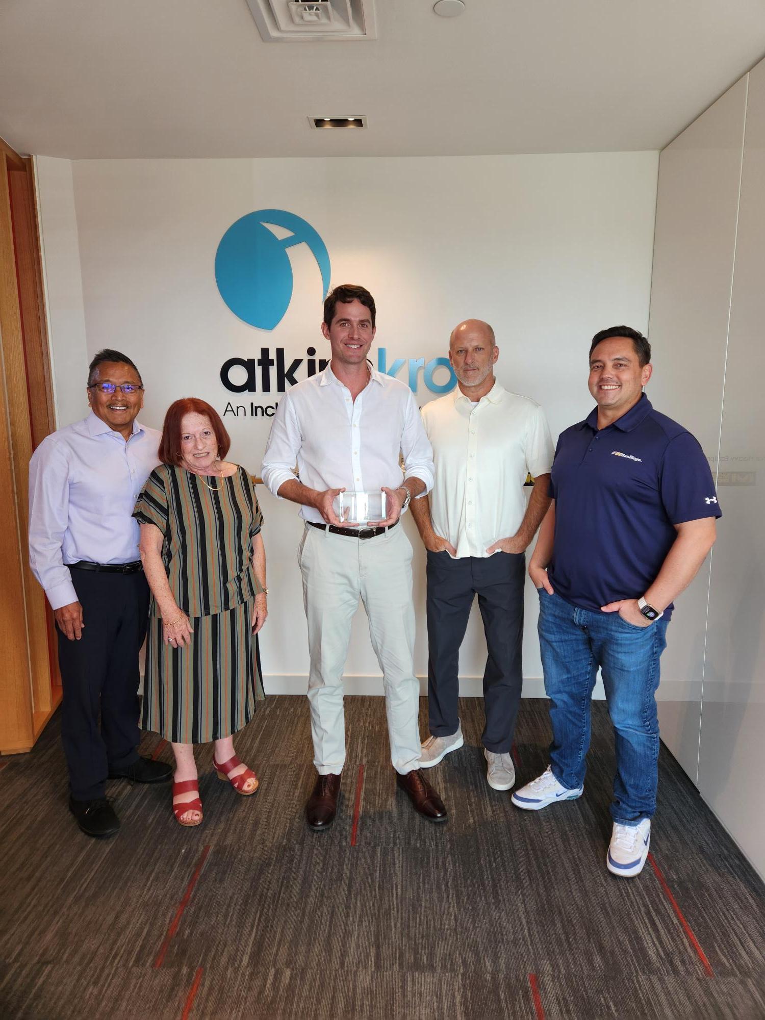 (From left) Ernie Galito, business development director, Atkins Kroll Inc.; Maratita; Clark Boswell, vice president and general manager of AK for Guam and Saipan; John; and Cook.