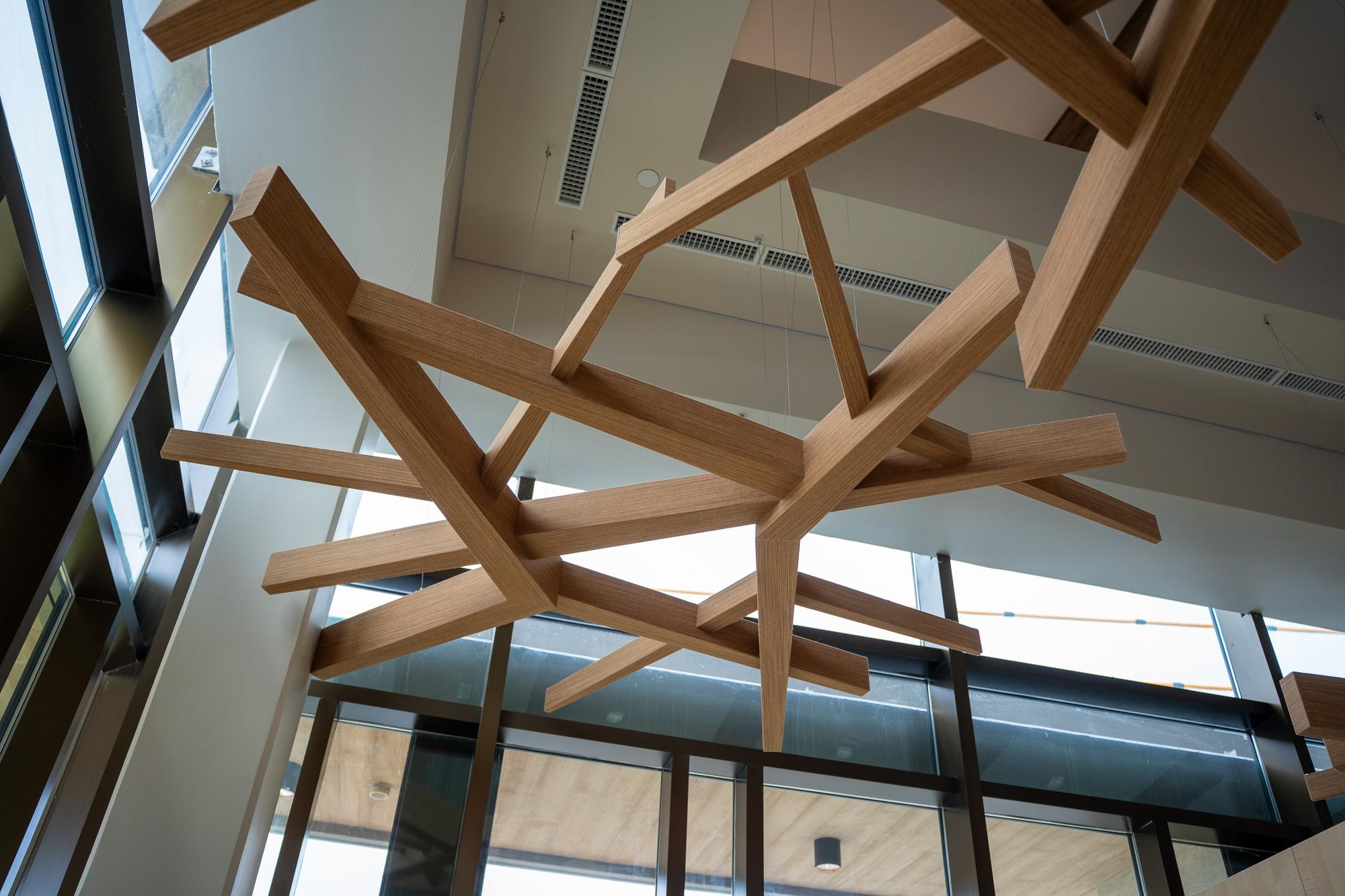 Micronesian stick chart patterns hang above the branch&#039;s &quot;pili rooms&quot;, an homage to the Western Pacific seafaring past. Photo by Skyler Obispo