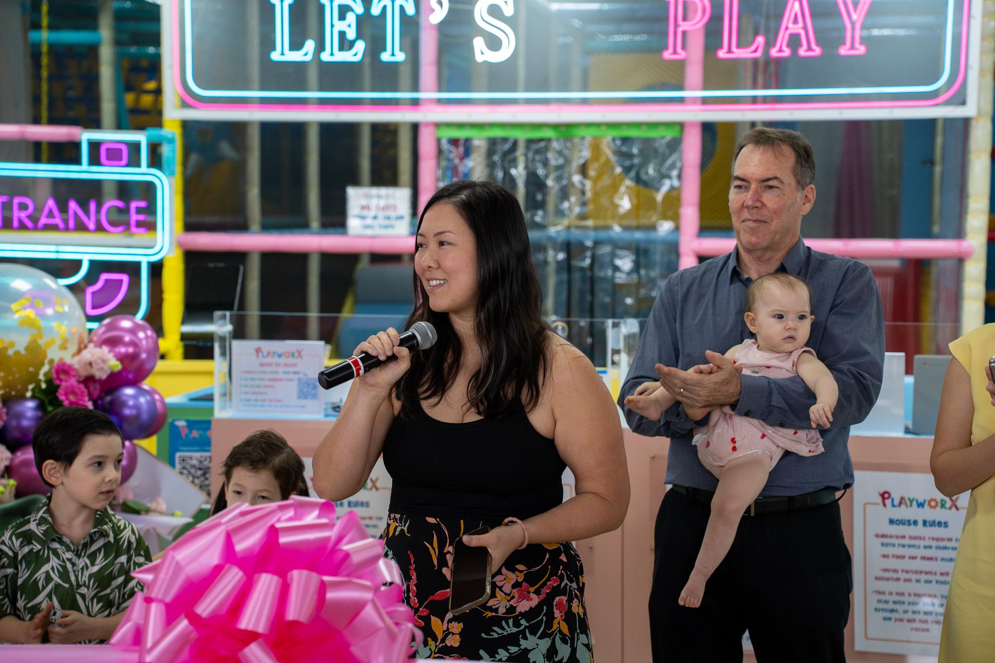 Richelle Canto, managing partner of PlayworX Guam, spoke to attendees of the PlayworX grand opening. Photo by Skyler Obispo. 