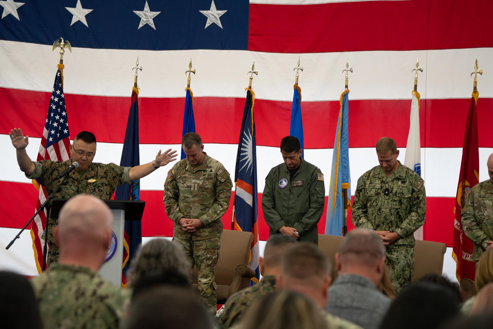 Cmdr. Johan Baik, chaplain for Marine Corps Base Camp Blaz, gave the benediction during a change of command ceremony. Photo by Skyler Obispo